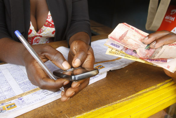 MTN mobile money withdraw charges mobile money in Uganda